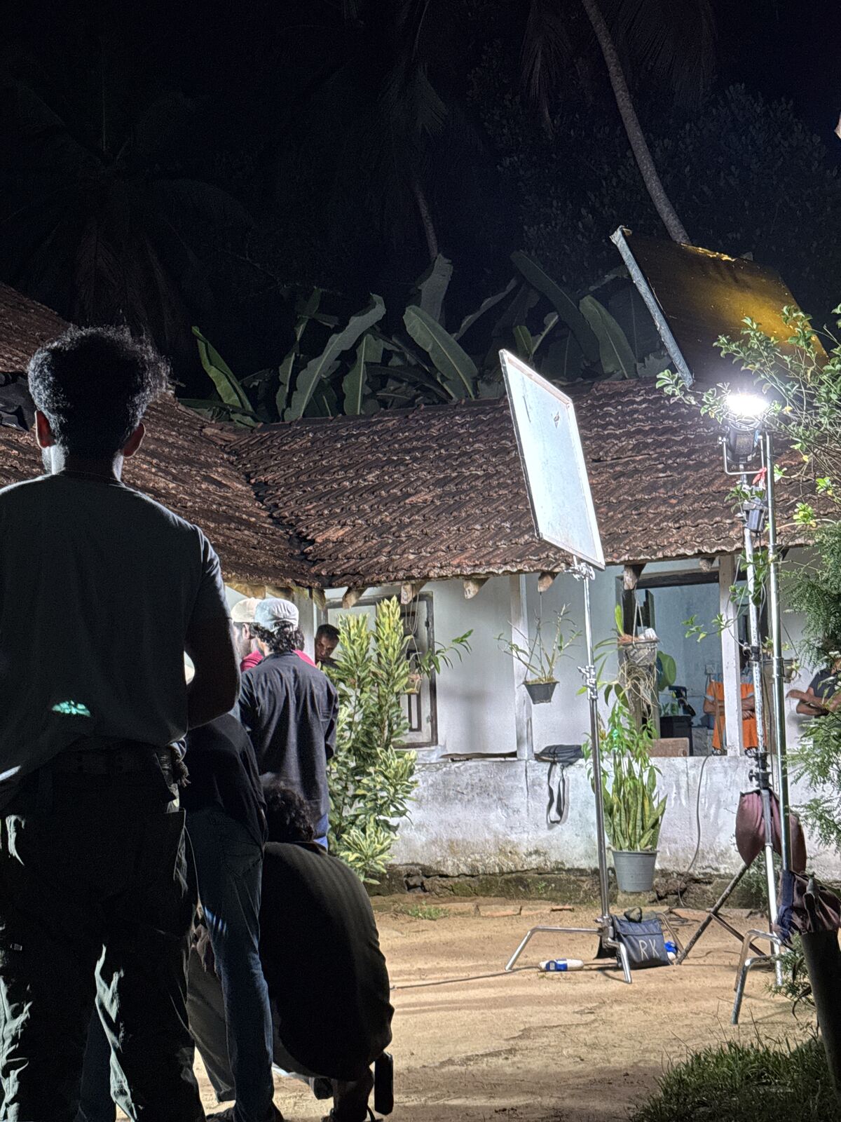 Camera crew capturing a scene during filming