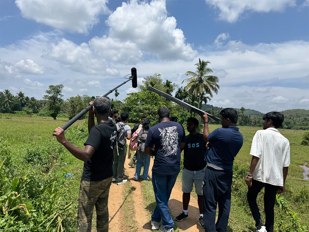 Cast and crew on location in the forest