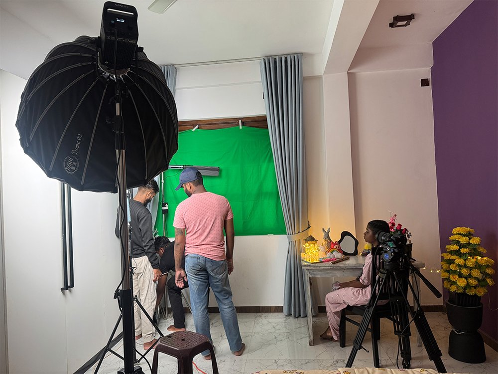 Setting up the green-screen studio for a shoot